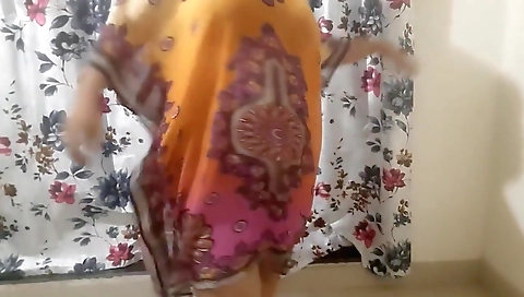 Desi Hot Bhabhi Getting Ready For Beach Wearing Bikini Inside Her Dress